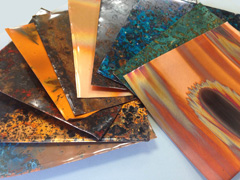 Copper sheeting can be laid on the countertop, with resin poured over top