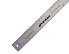 A deckle edge ruler allows the user to tear the paper along a rough metal edge