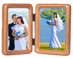 A hinged double frame displays two photographs from a wedding