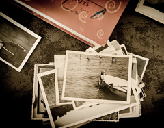 Old photographs can be scanned and prints made so the originals can be packed safely